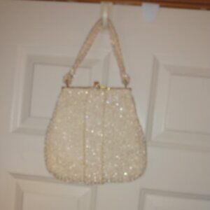 Corde: Cream color beaded vintage handbag with matching change purse & mirror.